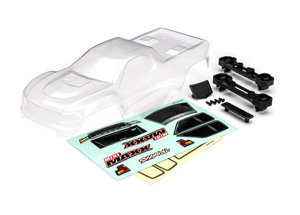 10711 TRAXXAS Body, Mini Maxx® (clear, requires painting)/ window masks/ decal sheet (includes front & rear body latches, hardware) (for clipless mounting)