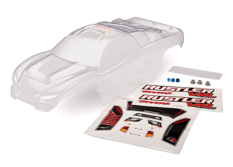 3714 Traxxas Body, Rustler (clear, requires painting)/window, lights decal sheet/ wing