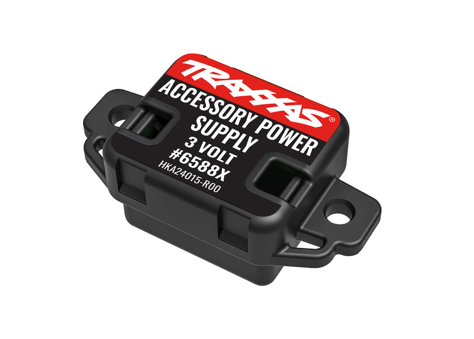 6588X Traxxas Accessory power supply (regulated, 3V, 3 amp)/ power tap connector (with cable)/ 3x10 BCS (2)/ 2.6x8 BCS (2)