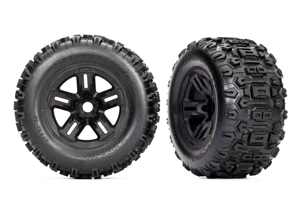 9672 Traxxas Tires & wheels, assembled, glued (3.8" black wheels, Sledgehammer® tires, foam inserts) (2)