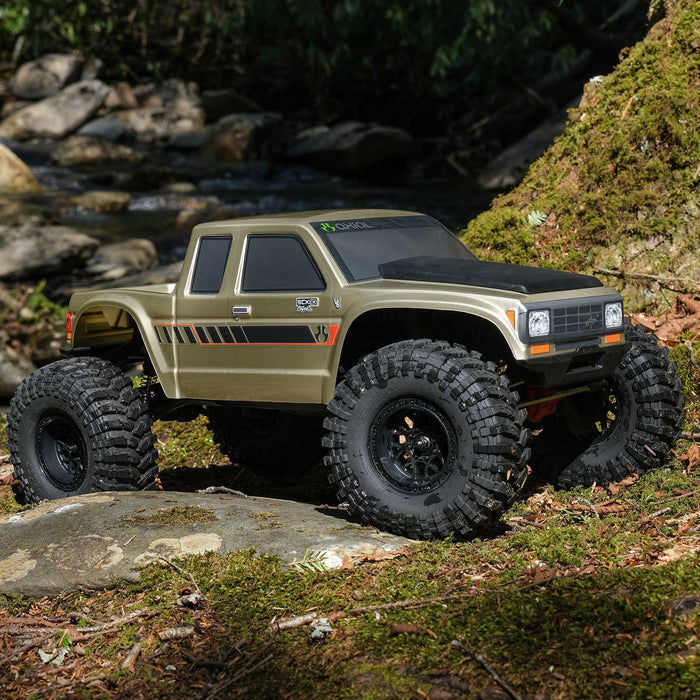 AXI-3071 Axial 1/10 SCX10 III Coyote 4X4 RTR Rock Crawler (Battery & Charger Included), Gold