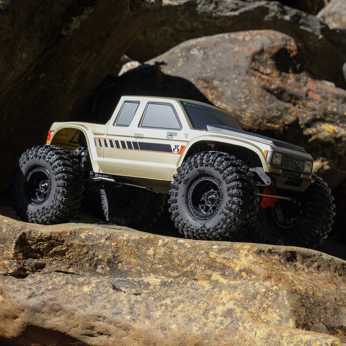 AXI-3071 Axial 1/10 SCX10 III Coyote 4X4 RTR Rock Crawler (Battery & Charger Included), Gold