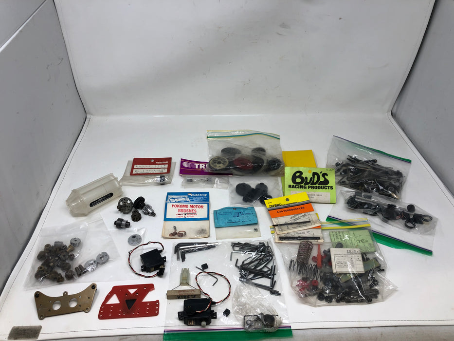 Vintage Rc Car parts lot, believed to be vintage Kyosho parts