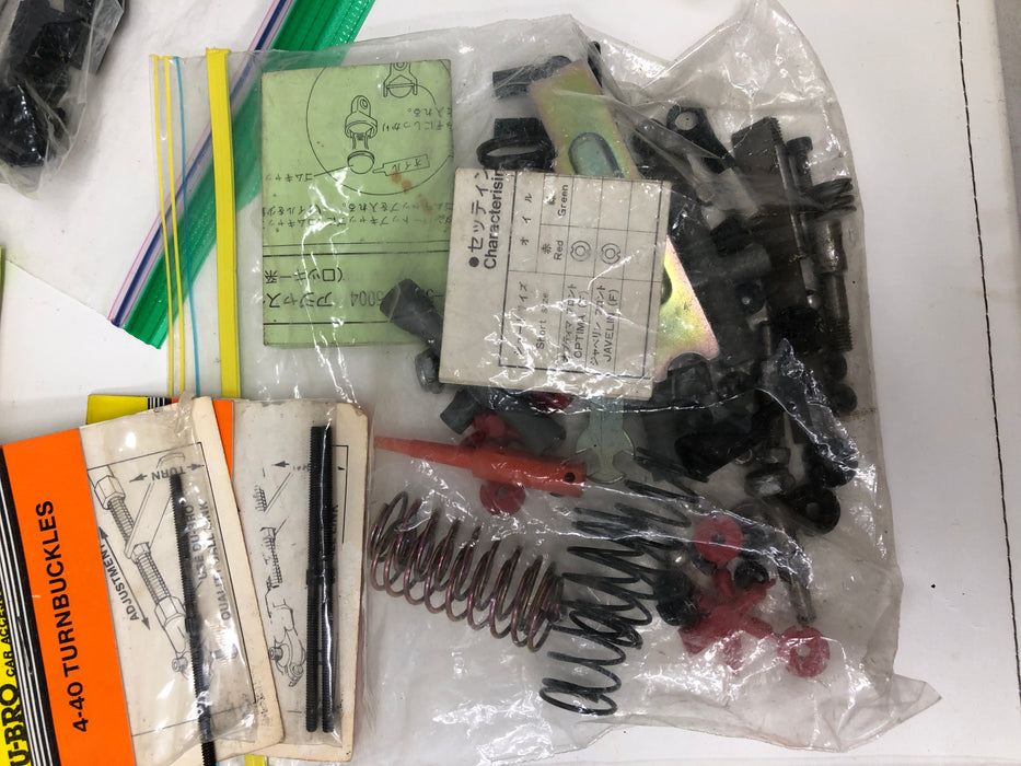 Vintage Rc Car parts lot, believed to be vintage Kyosho parts