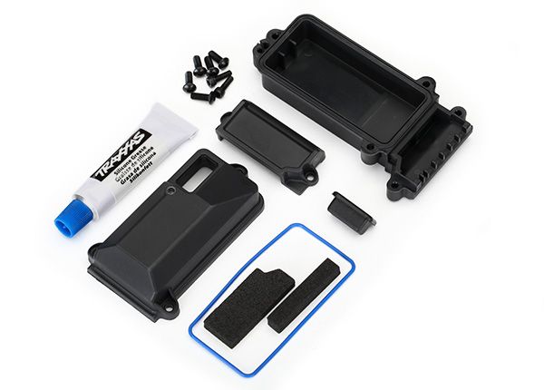 8224 Traxxas Box, receiver (sealed)/ wire cover/ foam pads/ silicone grease/ 3x8 BCS (5)/ 2.5x8 CS (2)