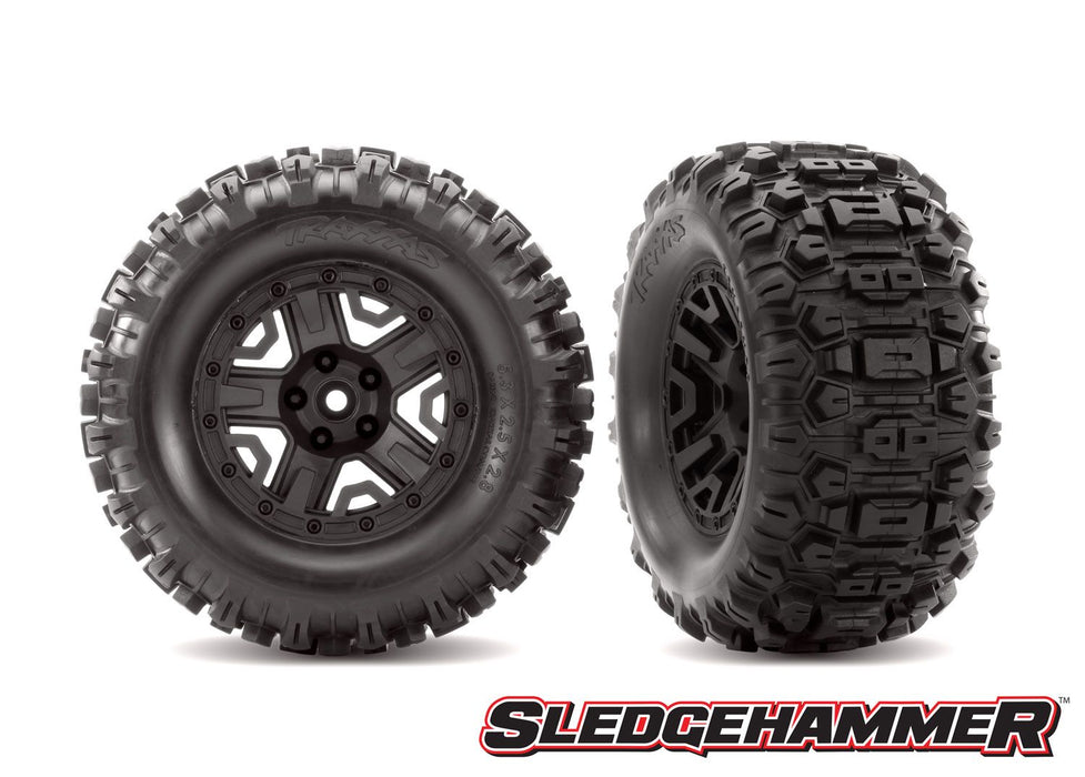 6792 Tires & wheels, assembled, glued (black 2.8" wheels, Sledgehammer™ tires, foam inserts) (2) (TSM® rated)