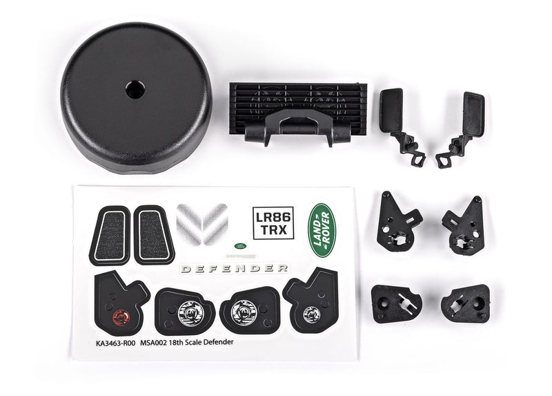 9720 Grille/ mirrors, side (left & right)/ spare tire cover/ light retainers, body (front & rear, left & right)/ decal sheet (fits #9712 body), TRX-4M