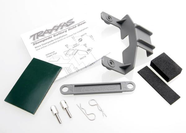 3627X - Battery hold-down (grey) (1) / receiver hold-down (grey) (1) / metal posts (2)/ spacers (2)/ body clips (2)/ servo tape/ adhesive foam pad